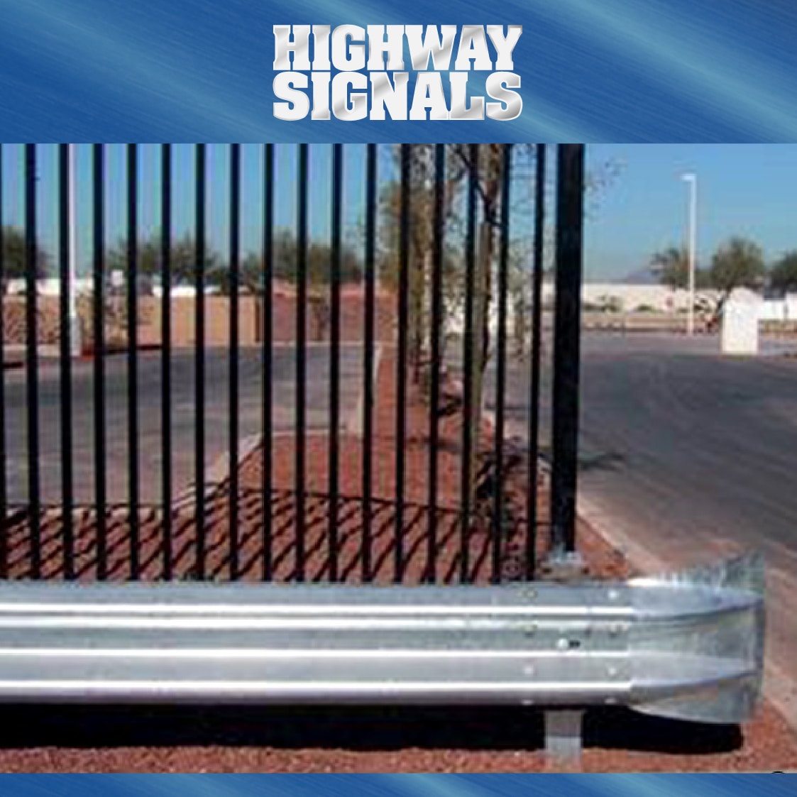 A Highway Guardrail Besides A Road Curve