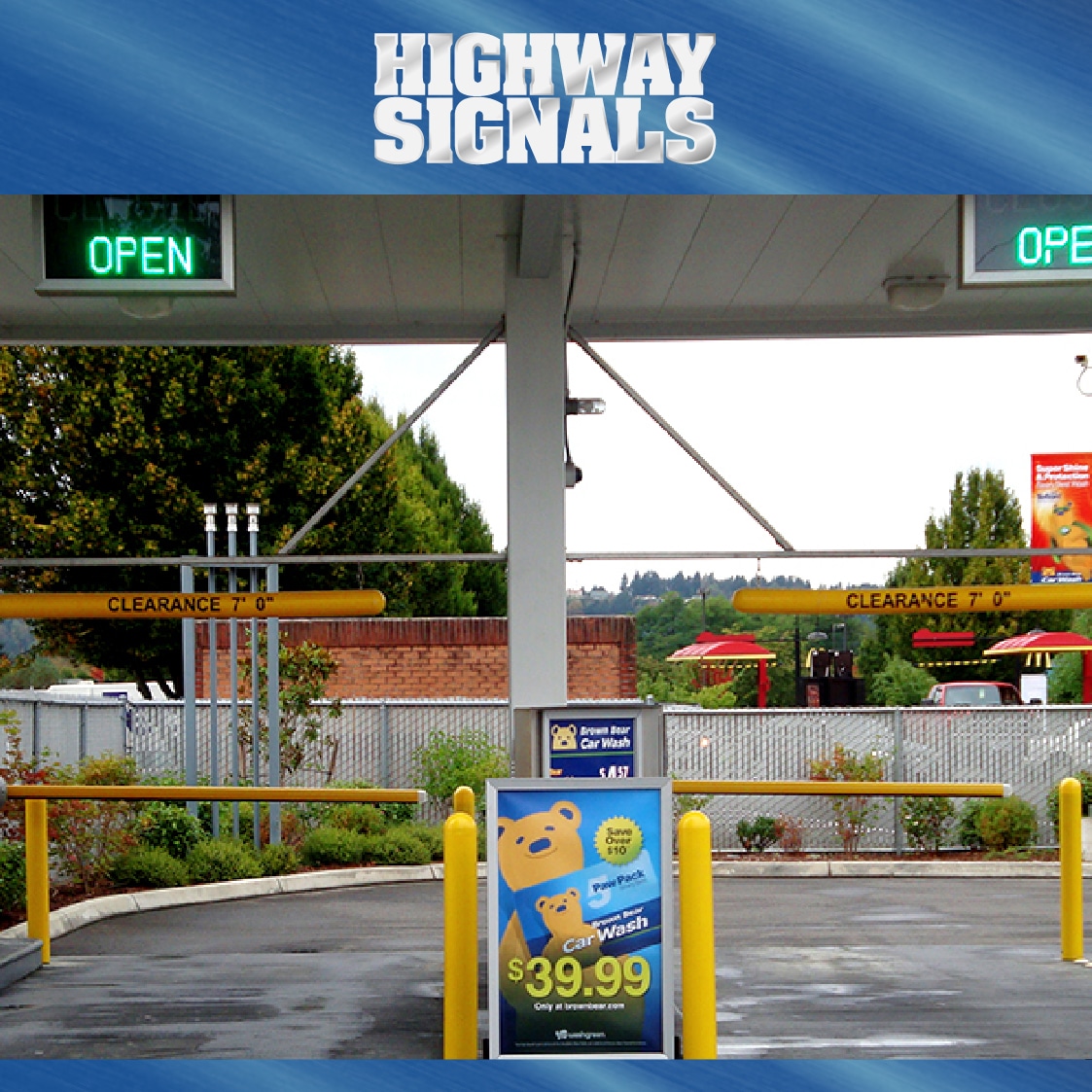 A Clearance Bar System Installed In A Car Wash Area