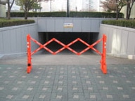 Multi-Gate Outdoor Collapsible Barricade Used to Block Off a Parking Garage